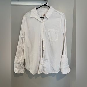 Women’s white buttons down shirt.